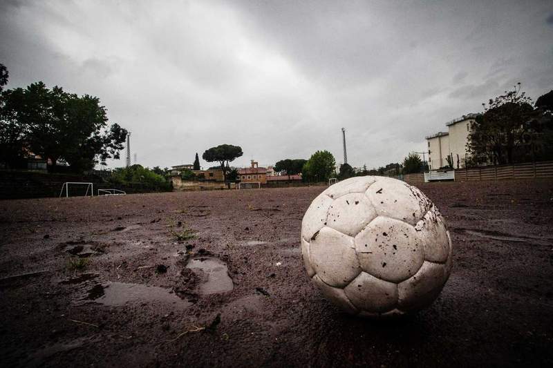 Football on the XXV Aprile pitch in Pietralata, Rome